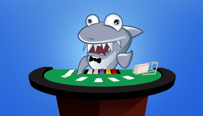 Kasinohai jakaa kortteja pelipöydän ääressä.