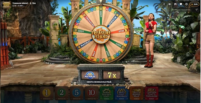 Pragmatic Playn Treasure Island -live game show Buumi Casinolla, jossa juontaja pyörittää suurta värikästä onnenpyörää trooppisessa studiossa.