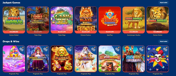 Buusti Kasinon ”Jackpot Games” ‑sivu, jolla näkyy Mega Moolah ‑ ja WOWPot‑jackpotpelejä, kuten Mega Moolah, Mega Moolah Megaways, Book of Mega Moolah ja Wolf Blaze WOWPot Megaways, sekä alapuolella Pragmatic Playn Drops & Wins ‑slotteja, jokaisen pelin tämänhetkinen jackpot‑ tai kampanjapotti esitettynä peli‑ikonin alla.