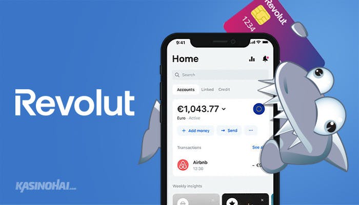 Kasinohai esittelee puhelimesta Revolut sovellusta, taustalla näkyy Revolut kortti.