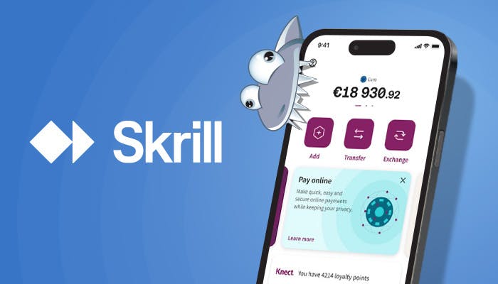 Kasinohai näyttää puhelinta, jossa on auki Skrill-sovellus.